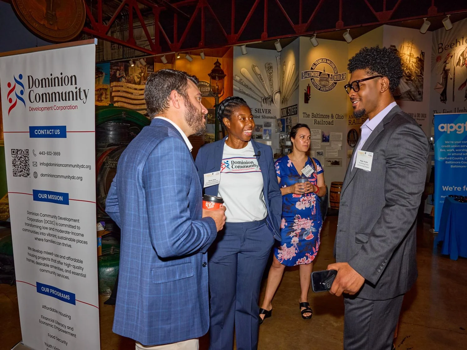 Nicole Earle networking with partners at a Dominion Community event