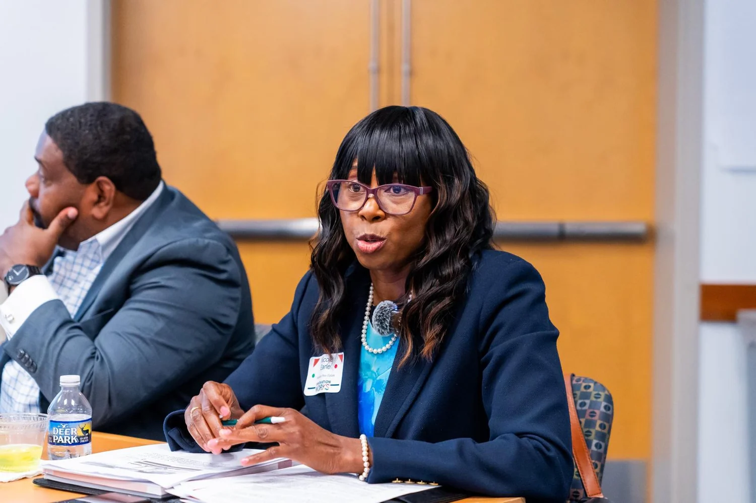Nicole Earle speaking during a roundtable discussion